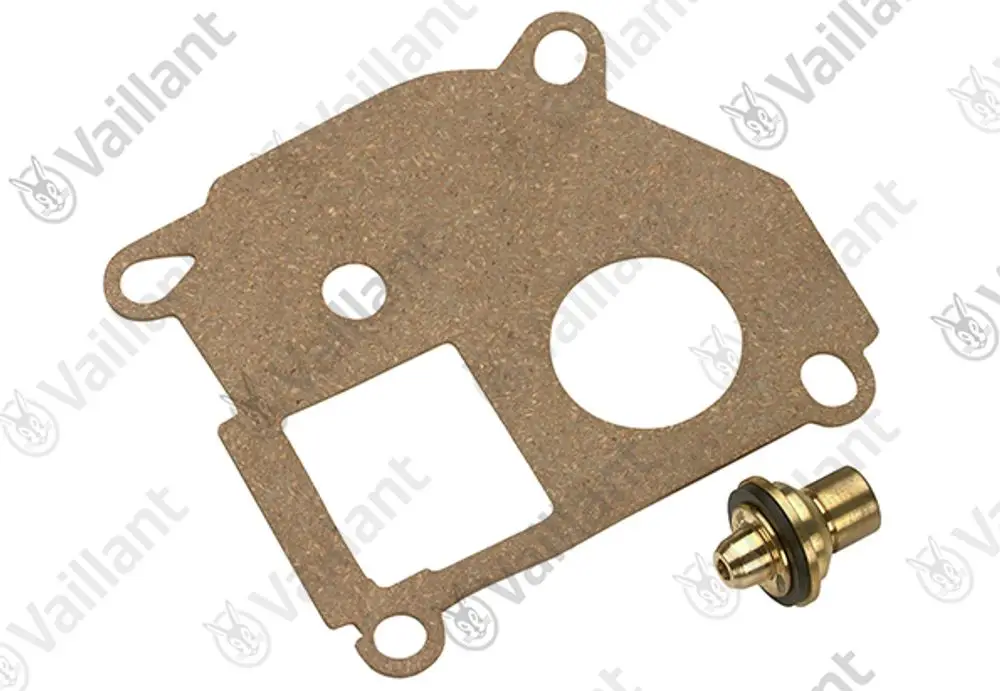 Wassermangelventil von Vaillant, aus einem Material mit einer dünnen, durchsichtigen Struktur, liegend; daneben eine goldene Metallkomponente mit Dichtung.